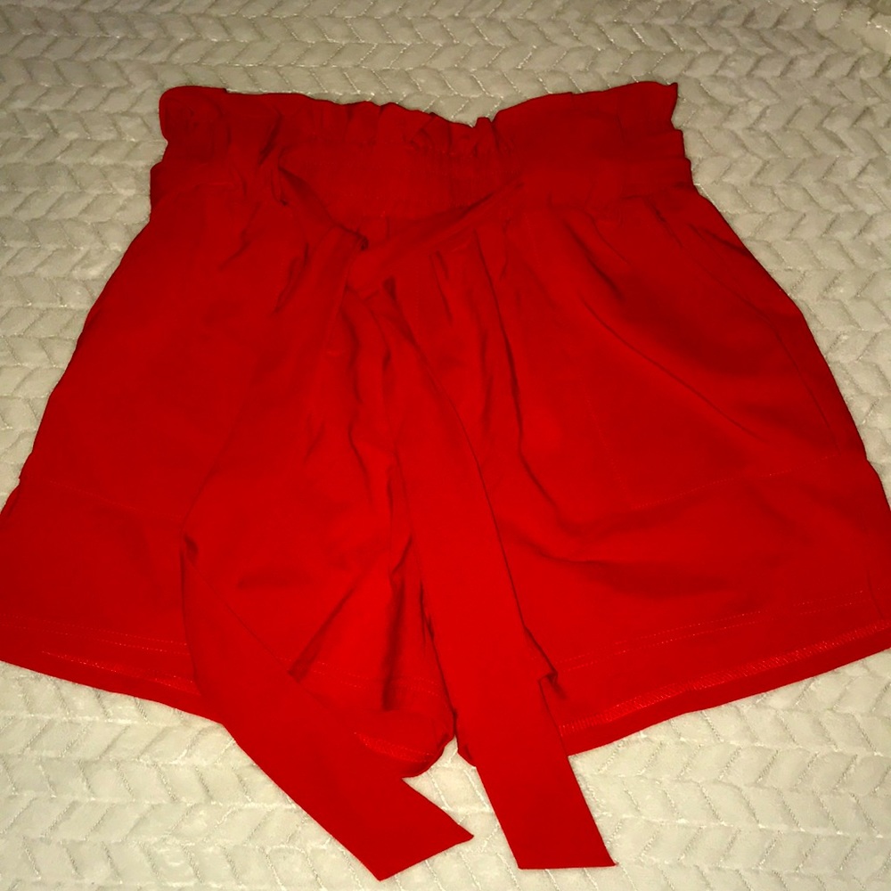 Red paper bag waist shorts